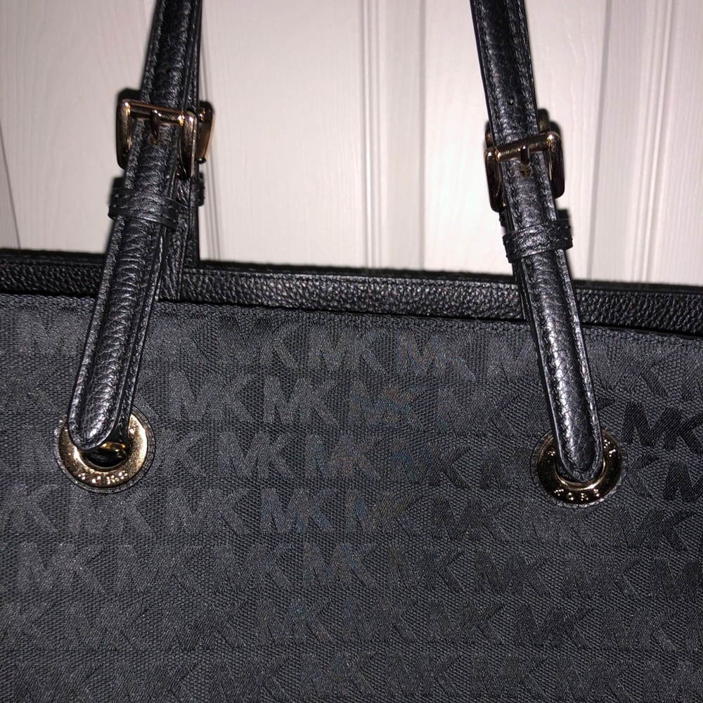 Michael kors black tote bag, used once!